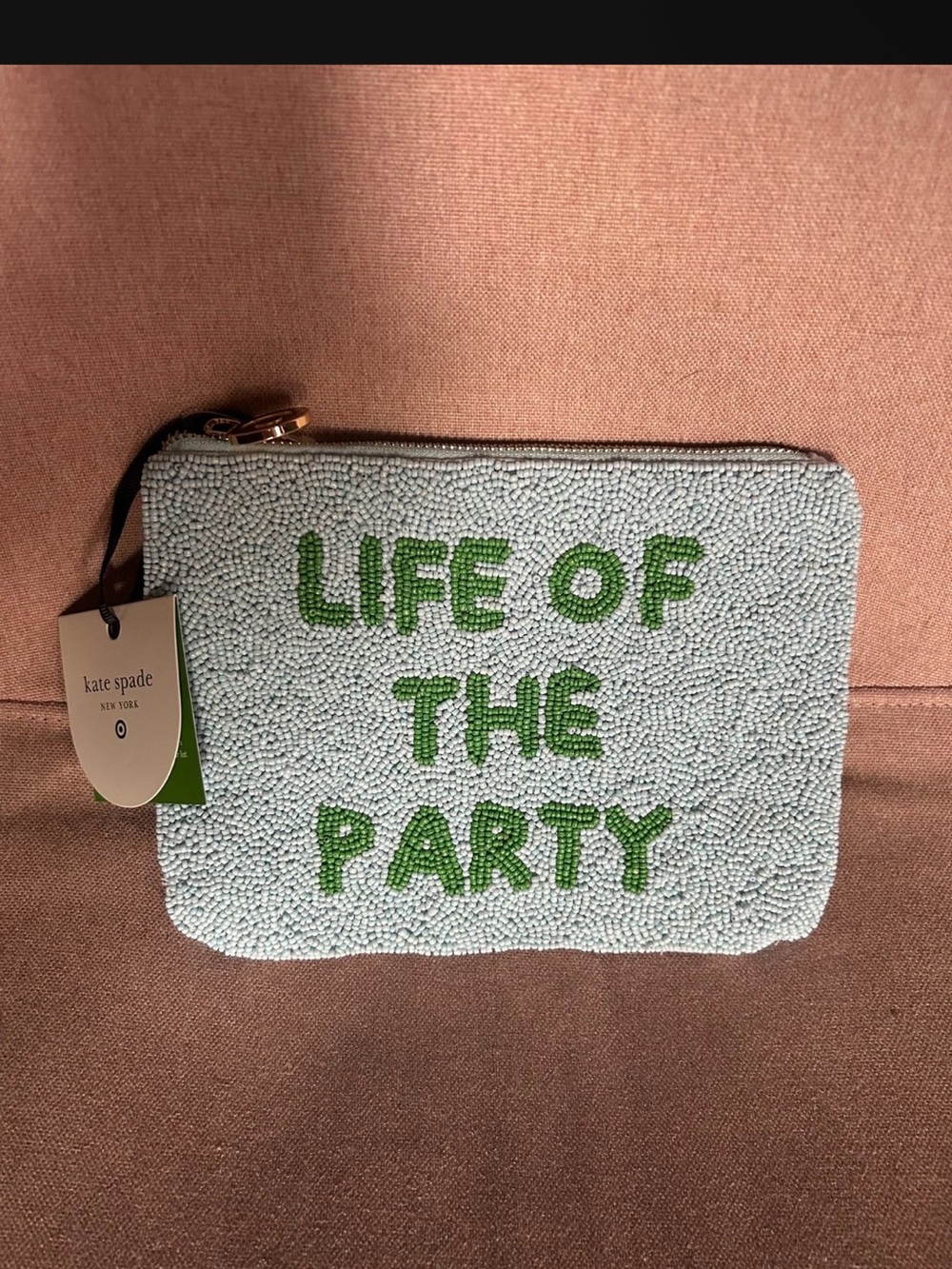 kate spade beaded pouch in light blue with green lettering